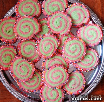 Christmas swirl butter cookies with sprinkles on the edges close-up
