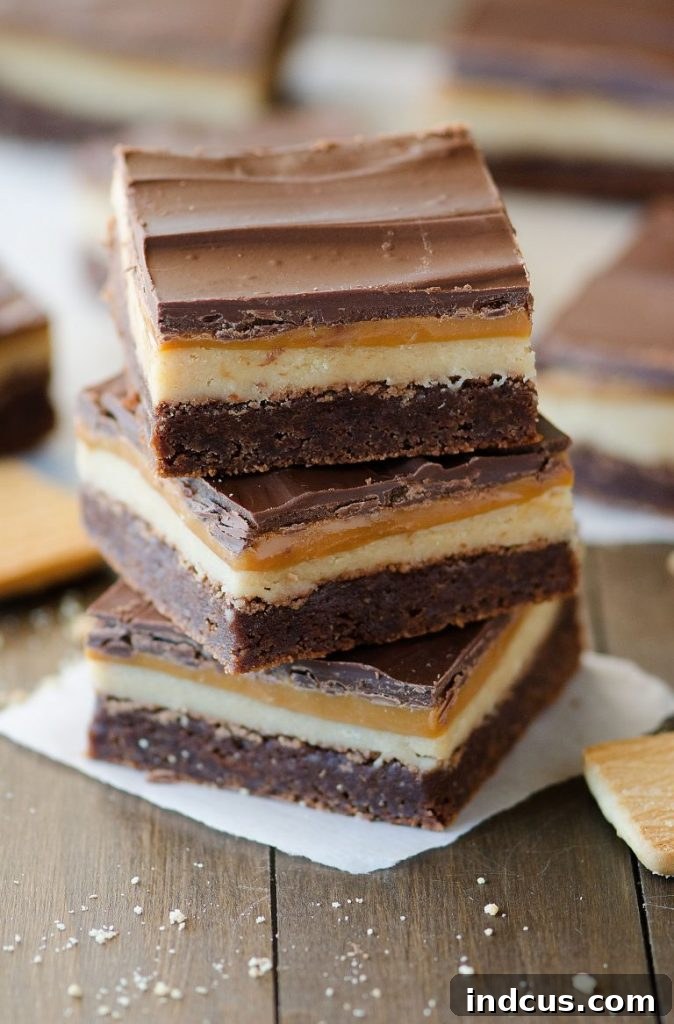 Amazing Twix Brownies with shortbread, caramel, and chocolate