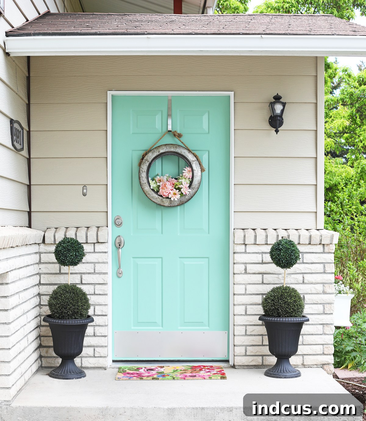 The Clarity Project 3 After front door painted: A newly painted Colonial Mint front door adds cheerfulness to the entryway