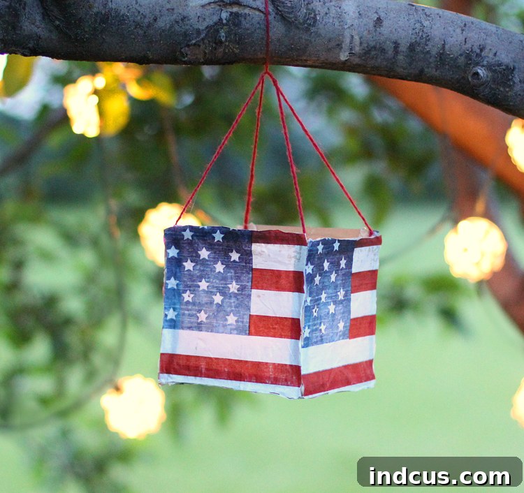 Easy DIY Fourth of July Luminaries crafted from paper bags and glow sticks, perfect for evening celebrations.