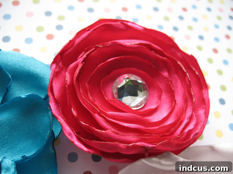 Stunning Satin Flowers DIY 7 Example of a DIY circular satin flower with melted edges