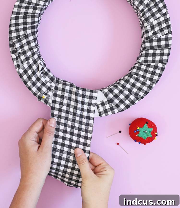 Fabric wrapped foam wreath base in buffalo check
