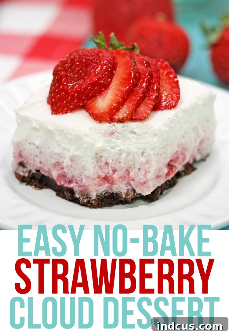 Stacked slices of Strawberry Cloud Dessert showing its perfect layers
