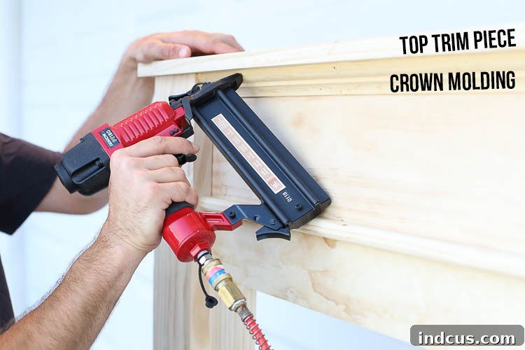 Attaching the top trim piece to the headboard