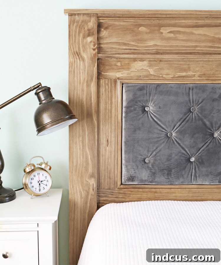 Attaching the upholstered panel to the headboard frame