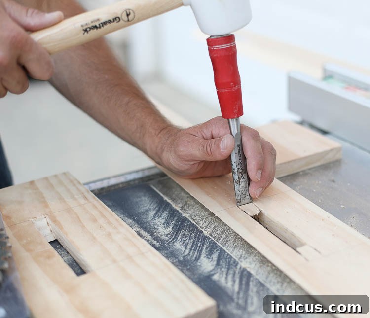 Chiseling out rounded corners of the mortises in the headboard posts