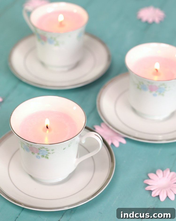 Repurposed thrift store teacup candles as handmade gifts.