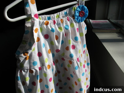 Close-up of a finished pillowcase dress, highlighting the elegant gathered waist and improved silhouette.