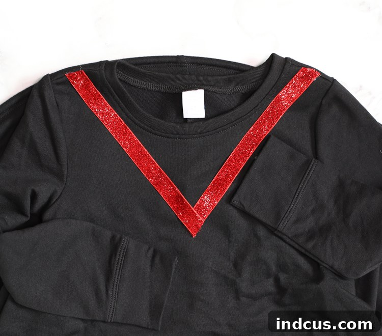 Red ribbon on Edna Mode costume