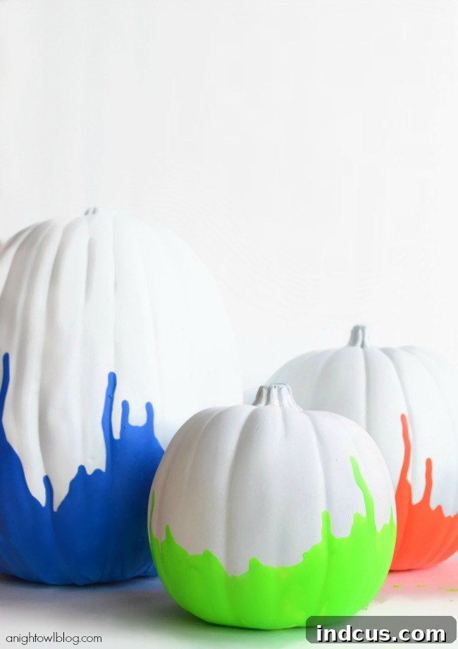 Neon dipped painted pumpkins for a vibrant display
