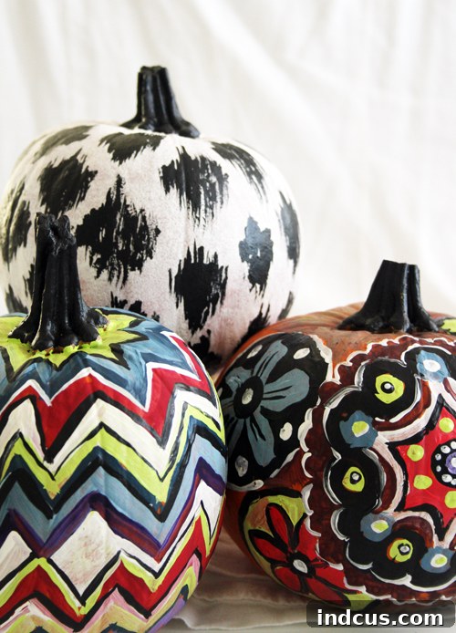 Artsy hand-painted pumpkins with intricate patterns