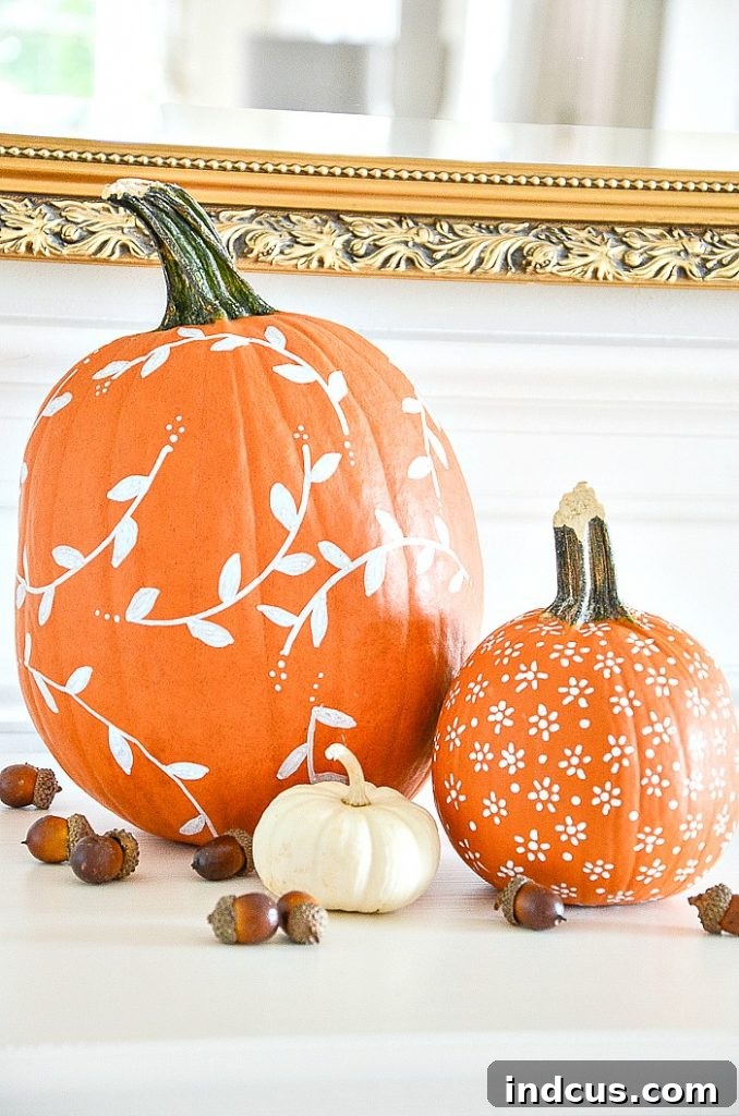 Elegant white patterned pumpkin with paint pen designs