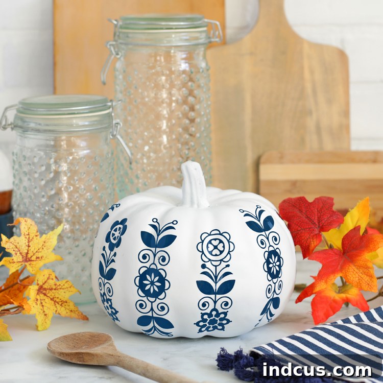 Folk art style painted pumpkins with intricate details