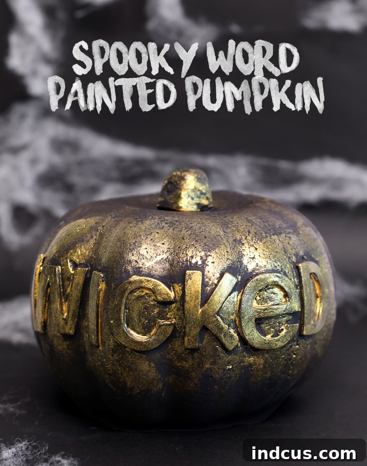 black and gold painted pumpkin for Halloween decor