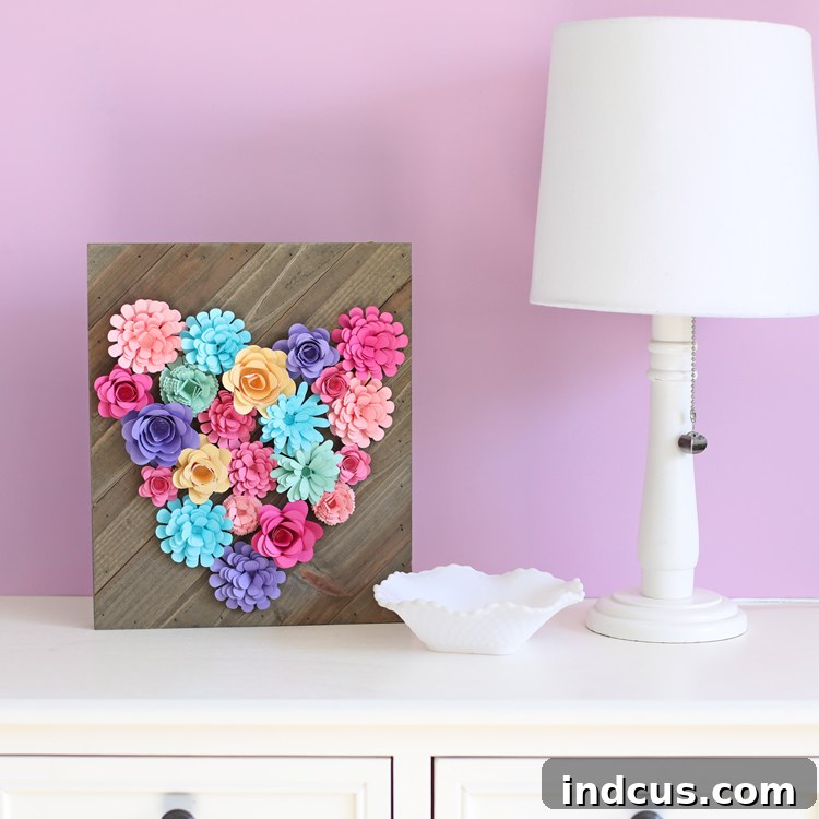 Crafting a decorative sign with rolled paper flowers
