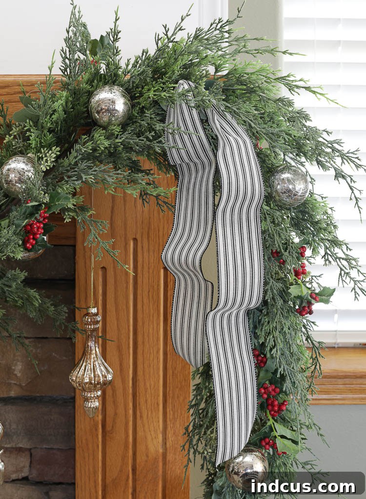 christmas mantel garland with realistic cedar and mercury glass ornaments