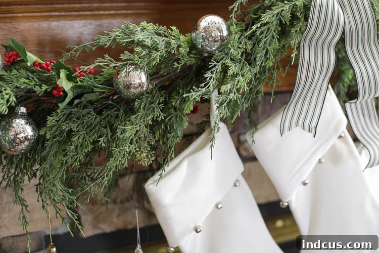 christmas mantel decorations with black and white ticking stripe ribbon