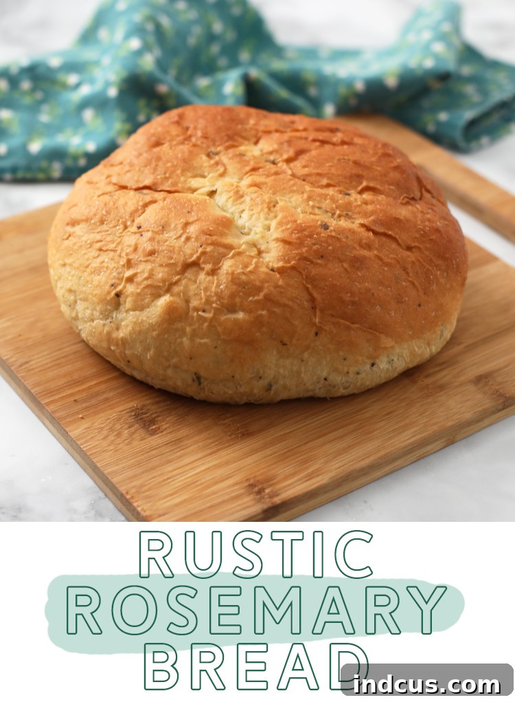 Close-up view of sliced rosemary bread showing the crispy crust, soft crumb, and fragrant rosemary