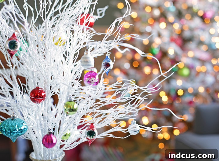 Vintage Christmas ornament display on a flocked tree at night