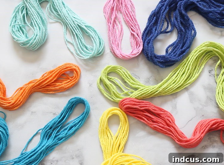 Easy macrame project in rainbow colors showing yarn preparation, a simple and enjoyable craft for beginners.