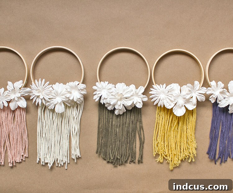 Finished mini embroidery hoop macrame wreaths strung together, creating a beautiful garland ready for display
