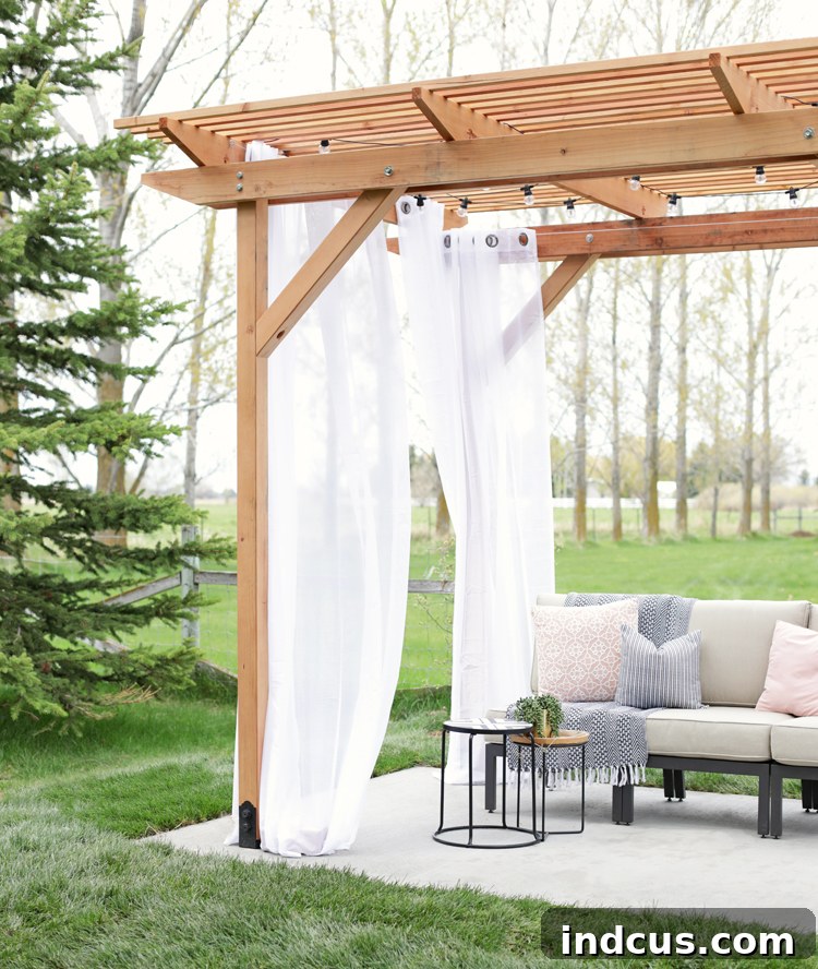 redwood pergola outdoor living space with stylish furnishings