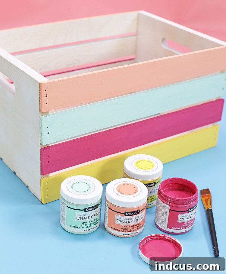 Painting a wooden crate for a DIY storage seat