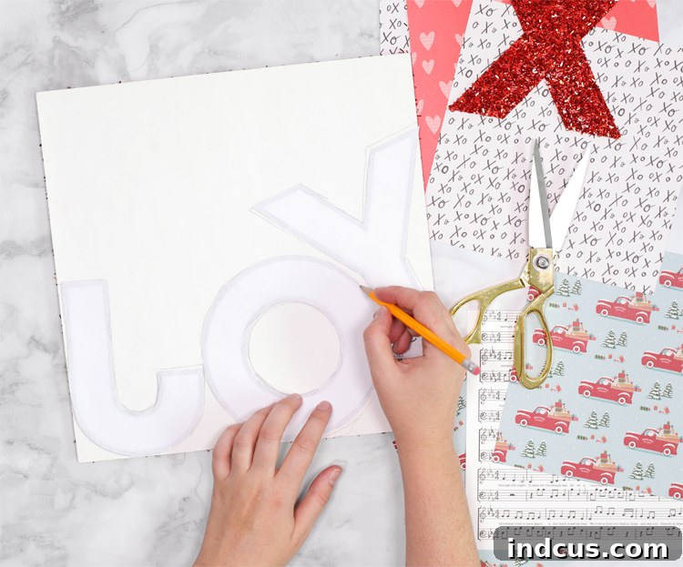 Customizable Holiday Plaque 5 tracing letters onto tinsel glitter paper