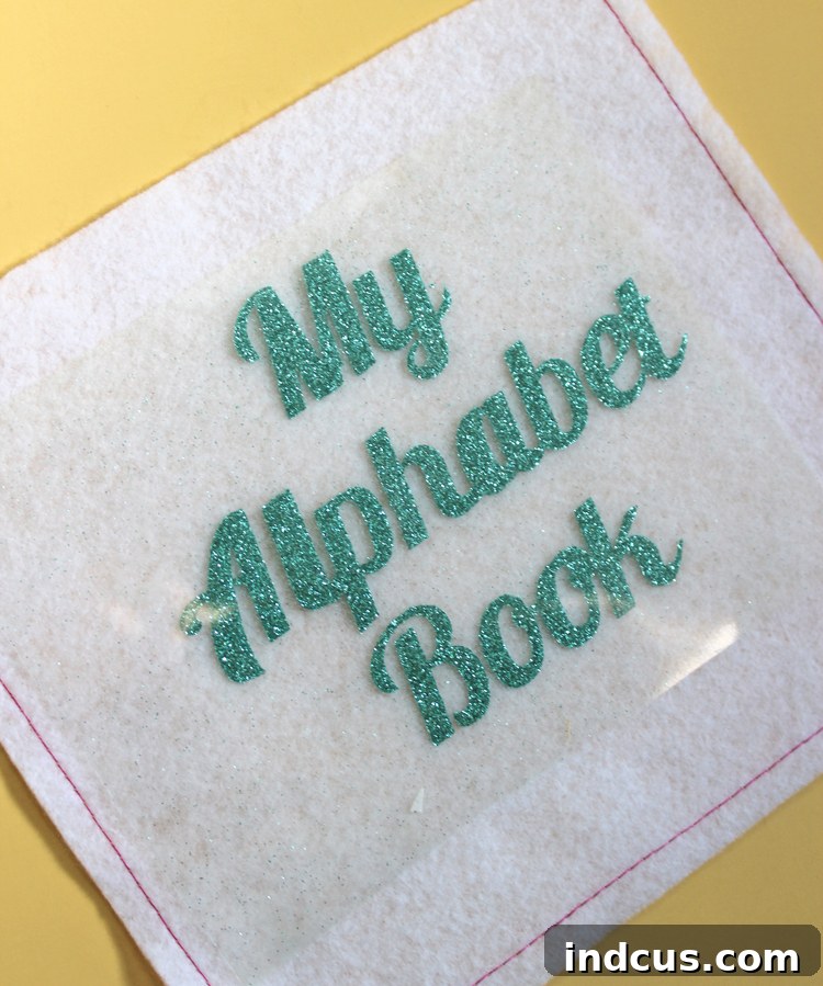 Detailed steps to create a personalized felt book for kids with custom iron-on vinyl