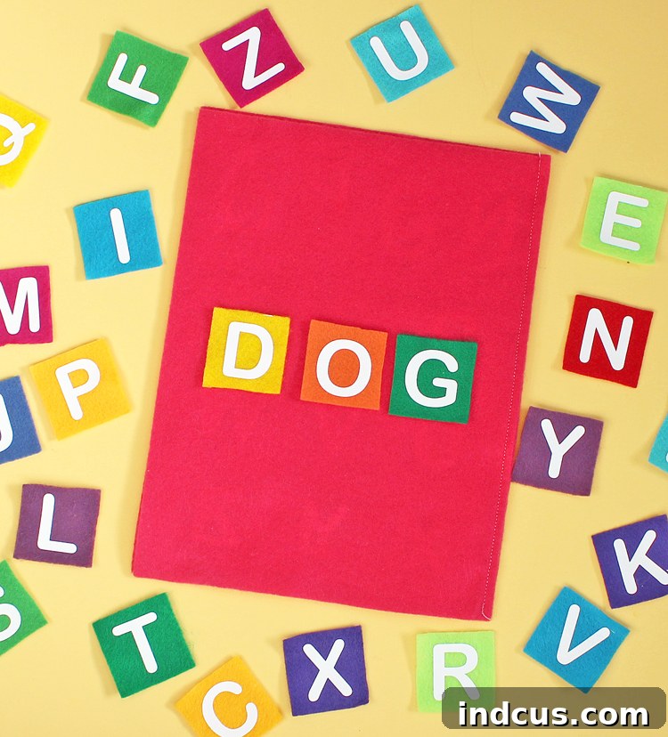 Child actively engaging with a homemade felt alphabet matching book, reinforcing letter recognition and fine motor skills