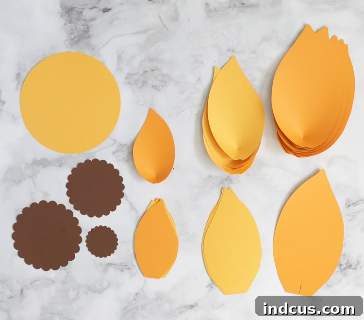 Crafting Giant Paper Sunflowers Your Complete Guide with Templates 5 Close-up showing how to fold and glue paper petals for a 3D effect.
