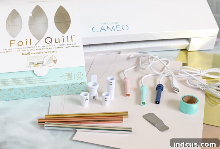 Contents of the Foil Quill Starter Kit displayed, including pens, foils, and adapters.