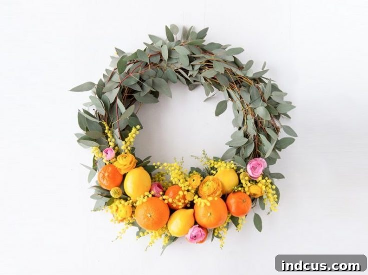 Gorgeous Citrus Spring Wreath featuring sliced fruit