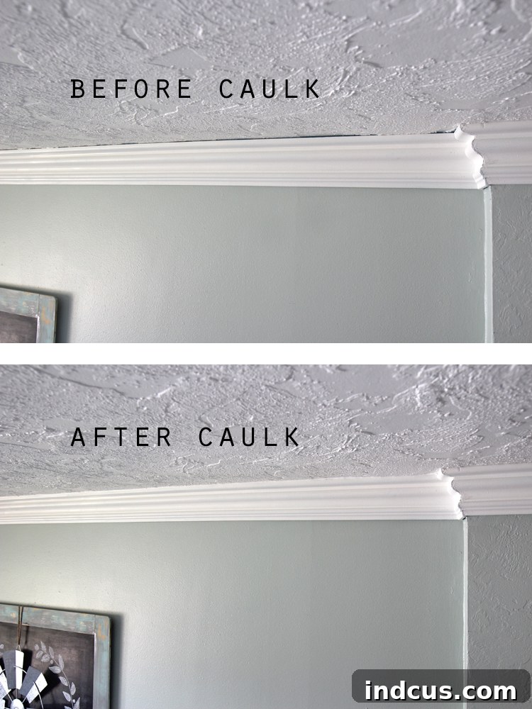 Close-up of caulk being applied to seal the gap between crown molding and the wall
