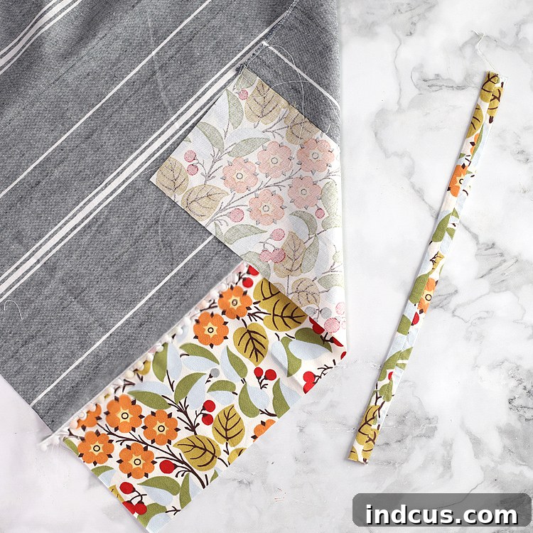 Sewing accent fabric to main body of bag holder