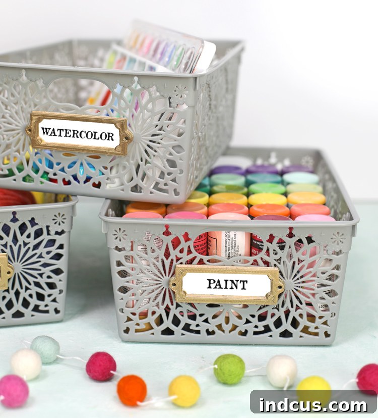 Customizable 3D Printed Labels 8 Stylish DIY labels attached to dollar store bins using 3D printed label holders and gold spray paint