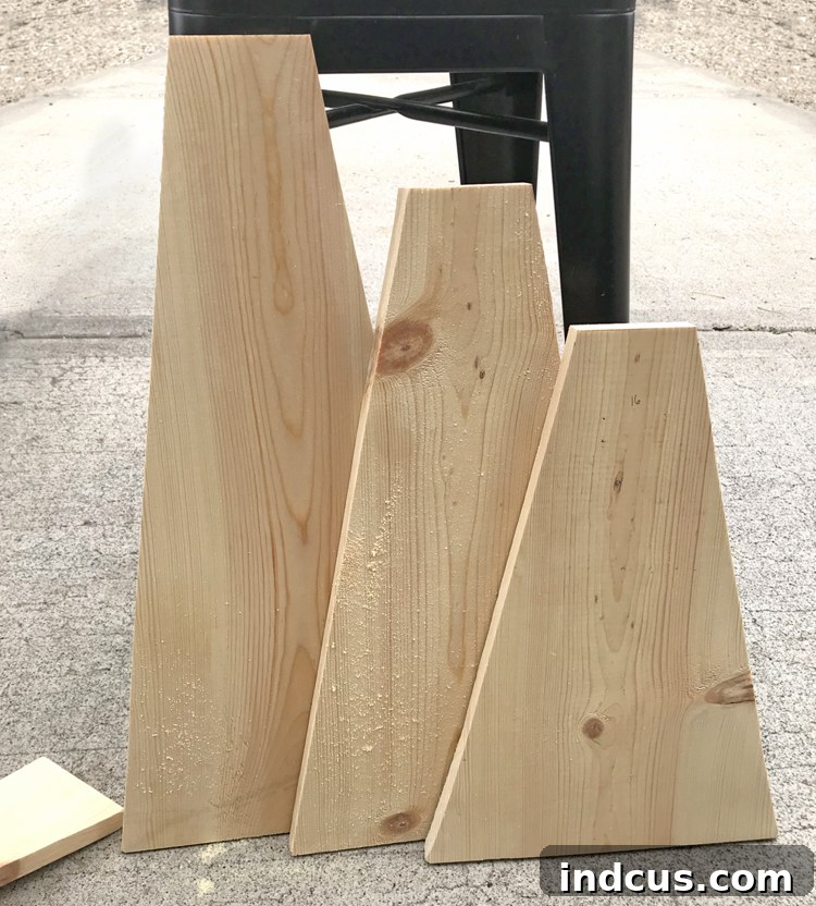 Wood craft with one board showing triangular pieces cut for the reversible design