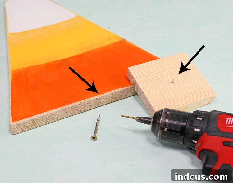 Adding the base to the candy corn wood, showing countersunk holes