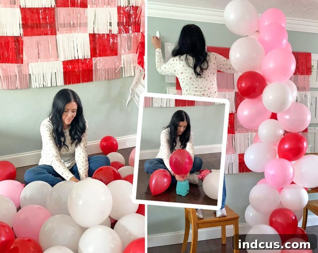 Easy DIY balloon garland in pink, red, and white for a Galentine's Day party.