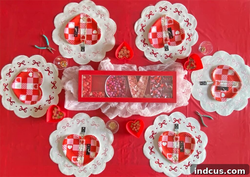 Galentine's Day party setup with DIY necklaces, snacks, and themed decor.