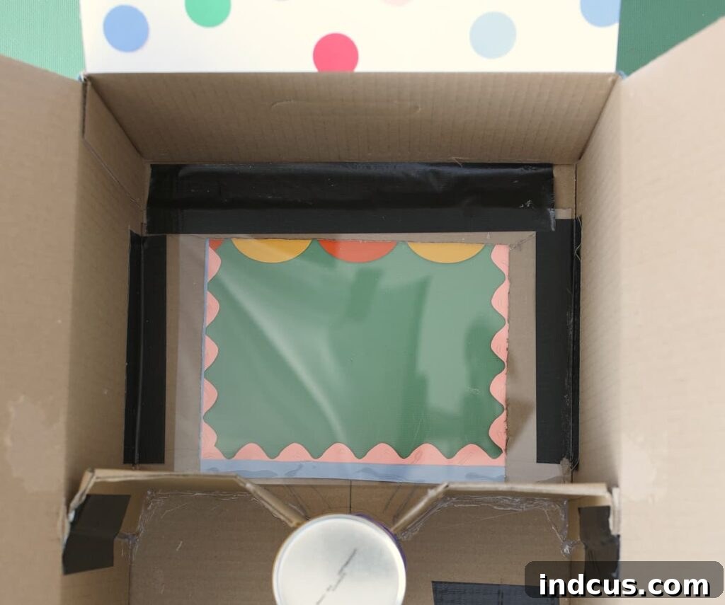 Handcrafted Party Prize Surprise 6 Plexiglass being installed over the window opening of the craft vending machine.