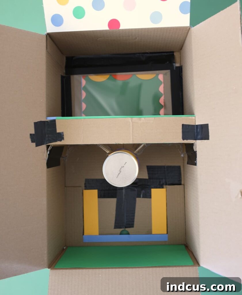 Handcrafted Party Prize Surprise 7 Cardboard prize ledge installed inside the vending machine.