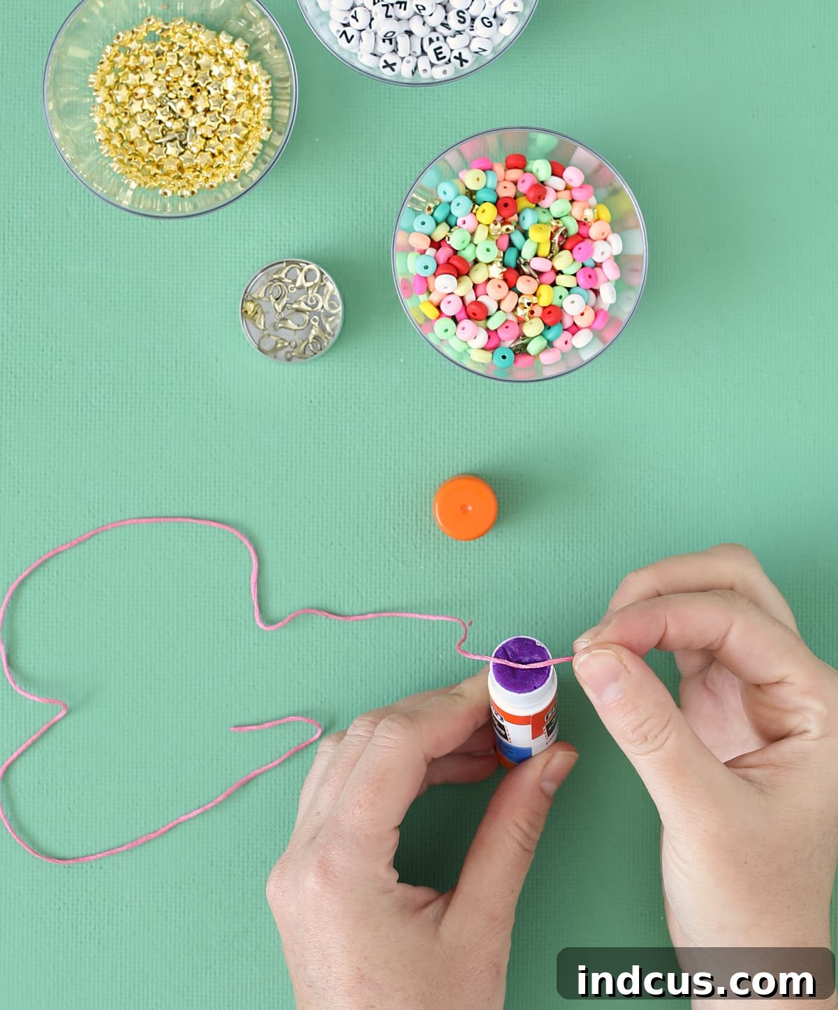 DIY Beaded Hat Charms: Step-by-Step Guide for Stylish Caps 4 glue ends of embroidery thread for stringing beads